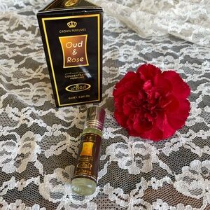 Oud & Rose .2 oz Perfume oil roller. Woody rose scent 
High quality. Men & women